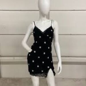 Lovely Day black slip dress with daisies in medium